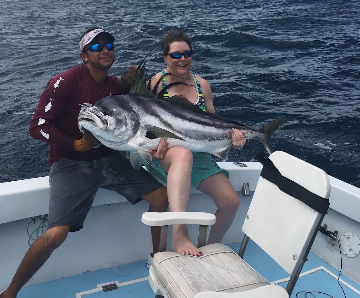 Jane and her 95lb roosterfish, caught with Costa Rica Fishing Charters